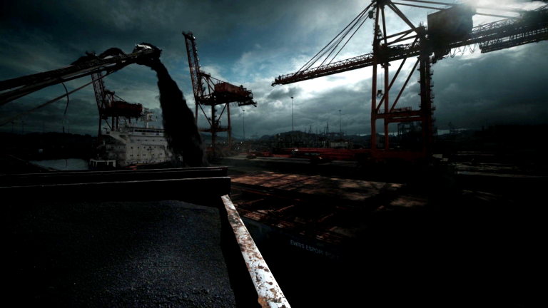Bulk carrier vessel loading iron ore