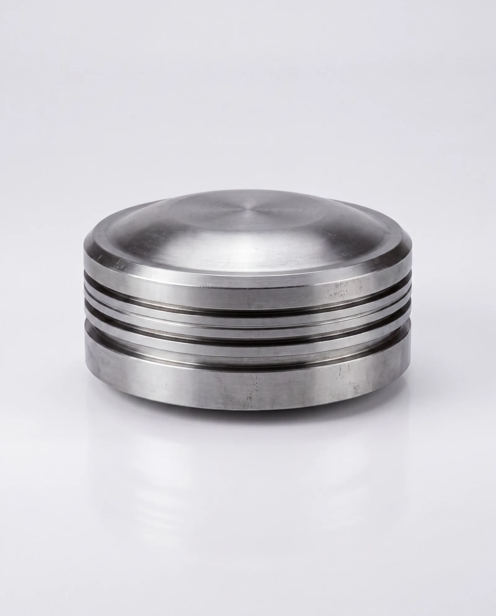 Reconditioned marine two-stroke engine piston crown machined to OEM tolerance